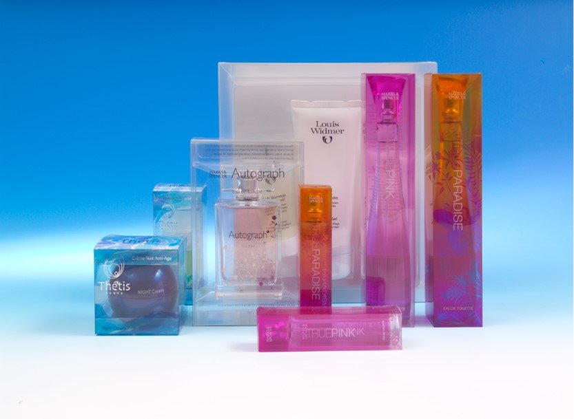 A collection of beauty products in clear plastic packaging