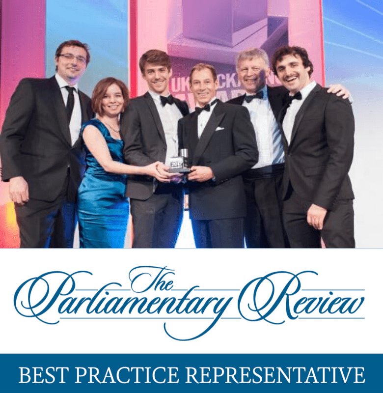 An image of Staeger Team receiving an award, and a banner for parliamentary review